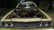 1973 Ford Torino - Front view of a 1973 Ford Torino with the hood open and engine removed, showing the empty engine bay.