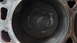 1973 Ford Torino - Engine cylinder with piston visible, showing signs of carbon buildup.
