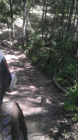 Tire and fender on an off-road trail