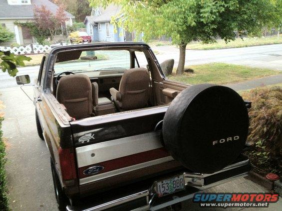 1991 Ford Bronco rear view, top removed, spare tire on tailgate
