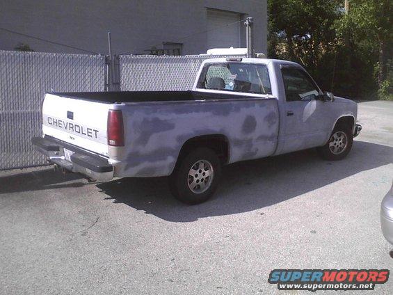 Chevrolet pickup truck, primer finish, rear 3/4 view