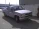 2003 Ford Crown Victoria - This light blue pickup truck, likely from the mid-1990s, is shown from a 3q front angle. The license plate is visible.