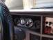 1988 Ford Bronco - Interior view of a vehicle's dashboard, displaying multiple gauges and switches.