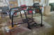 1988 Ford Bronco - Roll cage assembly in a garage, possibly for a custom build or restoration project.