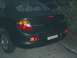 2000 Dodge Neon - Rear view of a dark-colored 2000 Dodge Neon sedan.
