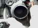 2000 Dodge Neon - A close-up view of an engine hose and associated components, with a watermark indicating the source.
