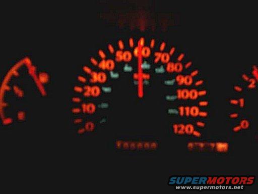 Speedometer showing around 50 mph, odometer reads 166666