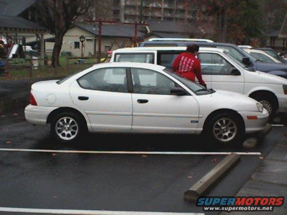White 1995 Plymouth Neon sedan, side view