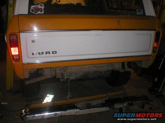 Rear of a yellow and white 1978 Ford Bronco with 'FORD' badging