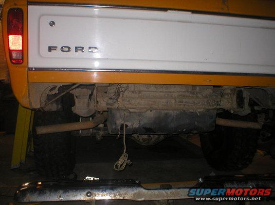 1978 Ford Bronco tailgate with FORD lettering, rear axle, and exhaust pipe