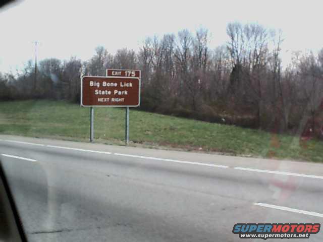 Roadside sign indicating Exit 175 for Big Bone Lick State Park, Next Right