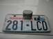 1978 Ford Bronco - A Washington state license plate is shown with a small gray device mounted on top of it.