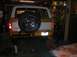 1978 Ford Bronco - Rear view of a 1978 Ford Bronco, showing the spare tire mounted on the tailgate.