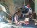 1996 Ford Bronco - Close-up of a broken transmission extension housing, revealing internal components and a driveshaft.