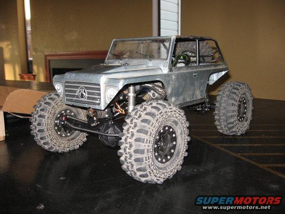 RC rock crawler with large tires and custom grille