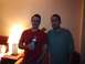 1993 Ford Probe - Two men pose for a photo in a room with a lamp and a bed in the background.