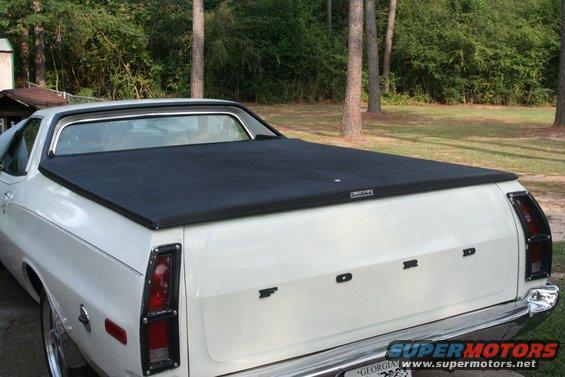 White 1976 Ford Ranchero with black bed cover, rear view