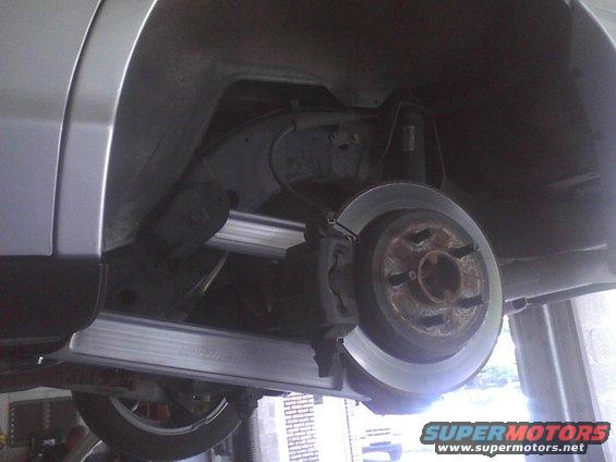 Rear brake assembly of a vehicle, viewed from underneath