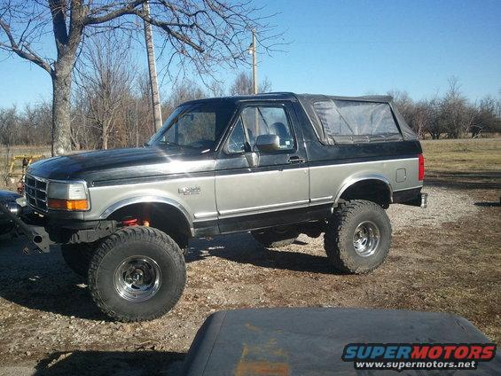Lifted two-tone SUV with soft top, 1993 Ford Bronco