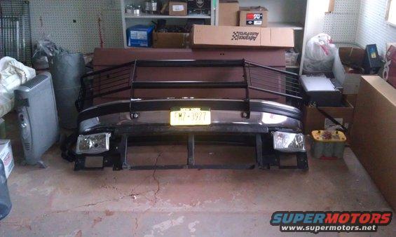 Front bumper with grille guard and yellow license plate FM7-3927