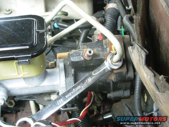 The PS feed port uses a 16mm inverted flare nut; the supply port is 18mm.