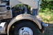 1959 Kenworth W900A - Detail shot of a truck's engine compartment and the front wheel well area.