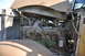1959 Kenworth W900A - The engine compartment of a truck is shown with various mechanical parts and wiring visible.