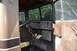 1959 Kenworth W900A - The interior of an old truck cab, a worn dashboard and steering wheel.