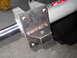 1992 Ford Bronco - Close-up of a custom-mounted steering component, branded PSC Motorsports, with visible welding on the bracket.