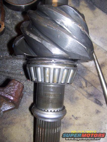 Last 9" I set up I dont recall shims going behind the pinion bearing?