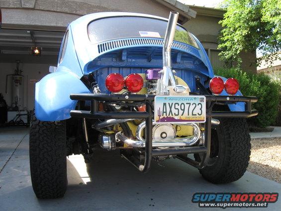 Blue 1970 Volkswagen Beetle Baja Bug with custom rear bumper, exhaust, and lights. Arizona license plate AX59723