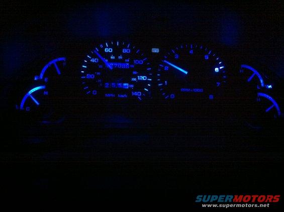 1994 Ford Probe dashboard gauges with blue illumination