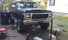 1979 Ford Bronco lifted with large tires, front view