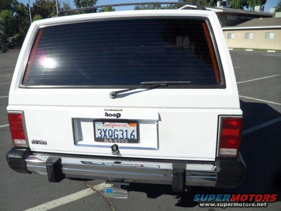 White 1994 Jeep Cherokee rear with California license plate 3XQG316