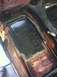 1970 Volkswagen Beetle - The floor pan of a car shows signs of rust repair and modification.