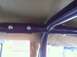 1970 Volkswagen Beetle - Interior view of a vehicle's roll cage, secured with bolts.