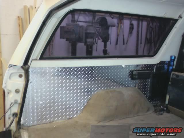 Nice pretty diamond plate.  And new mounts for the 6x9's