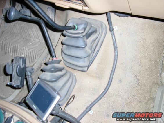 I was running out of room in the dash, so I put the add-ins (xm radio, ipod adapter, etc) in the center console and used the loom to hide the wiring.