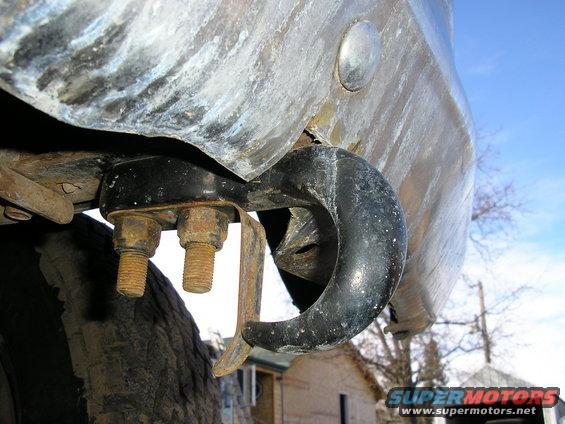 I used one existing bolt hole, and drilled a 2nd one in the frame horn.  To clear the bumper, I had to notch it a little bit.