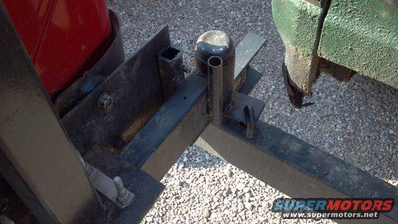 131.jpg Locking pin for the hinge to hold the arm open.