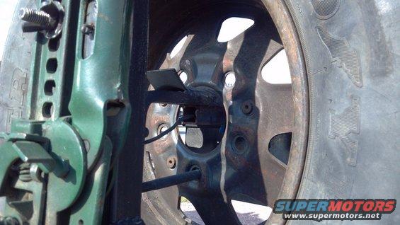 Rear view of the spare tire mount.  Some parts came off the stock Bronco spare tire carrier, I just mounted it to my bumper and post.