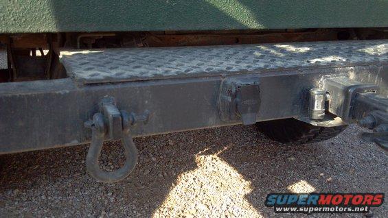 142.jpg Rear bumper:  D-ring mounts   the trailer electrical hookup.