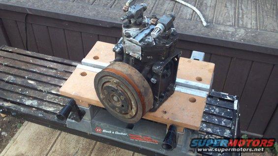 York 210 R A/C compressor from a '69 TravelAll.  York compressors are desired for this kind of upgrade because unlike most A/C compressors that require lubrication from the R-134/12 refrigerant, the York has it's own internal oil supply