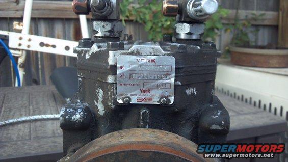 The manufacturer's plate.  With the engine idling  at 750 RPM (taking into account the diameter of the crankshaft pulley and the alternator pulley), the York 210 will pump out about 2.4 CFM.  If I goose the throttle to 2000 RPM, it jumps to about 6.4 CFM