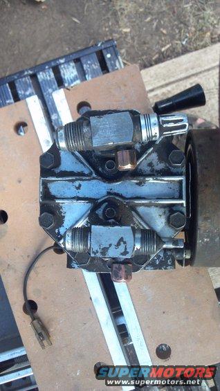 Looking down on the York.  The fitting on the left is the intake, and I tapped it out for 1/8 NPT.  The fitting on the right is the discharge, and tapped out for 1/4 NPT