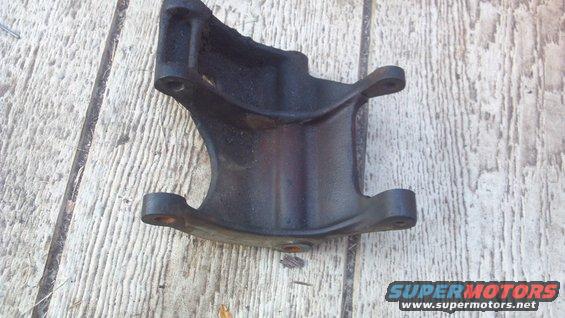 Original smog bracket.  My custom bracket attaches  to the two upper tabs.