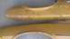 1973 Chevrolet Camaro - Two yellow fender parts show significant rust and paint damage.