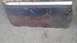 1973 Chevrolet Camaro - This heavily rusted car panel shows significant deterioration and damage.
