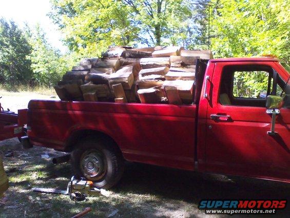 1987 Ford F-250 side view, bed full of cut firewood