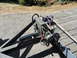 1966 International Scout 800 - A winch and battery are mounted on a trailer, ready for use.